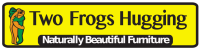 Two frogs hugging