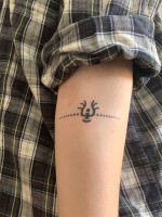 Sky people tattoo