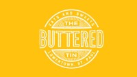 The buttered tin
