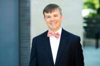 Scott kroner plc